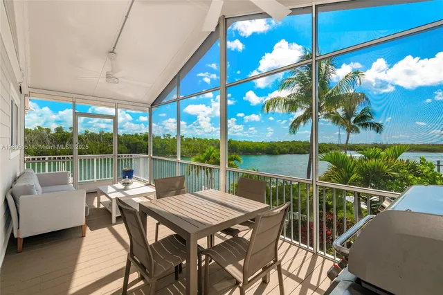 a view of a patio with swimming pool