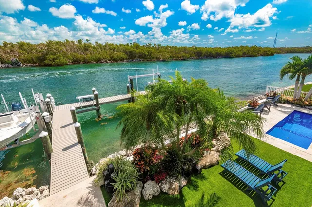 a view of a lake with a big yard