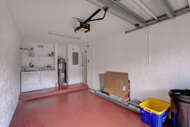 a spacious bathroom with a tub and toilet