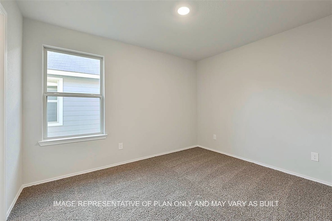 5407 Bear Run Bryan, TX 77807 - Photo 9 of 13 an empty room with a window