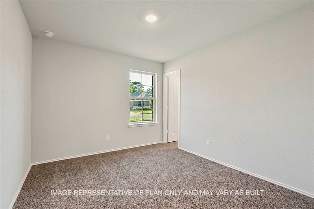 5407 Bear Run Bryan, TX 77807 - Photo 8 of 13 an empty room with windows