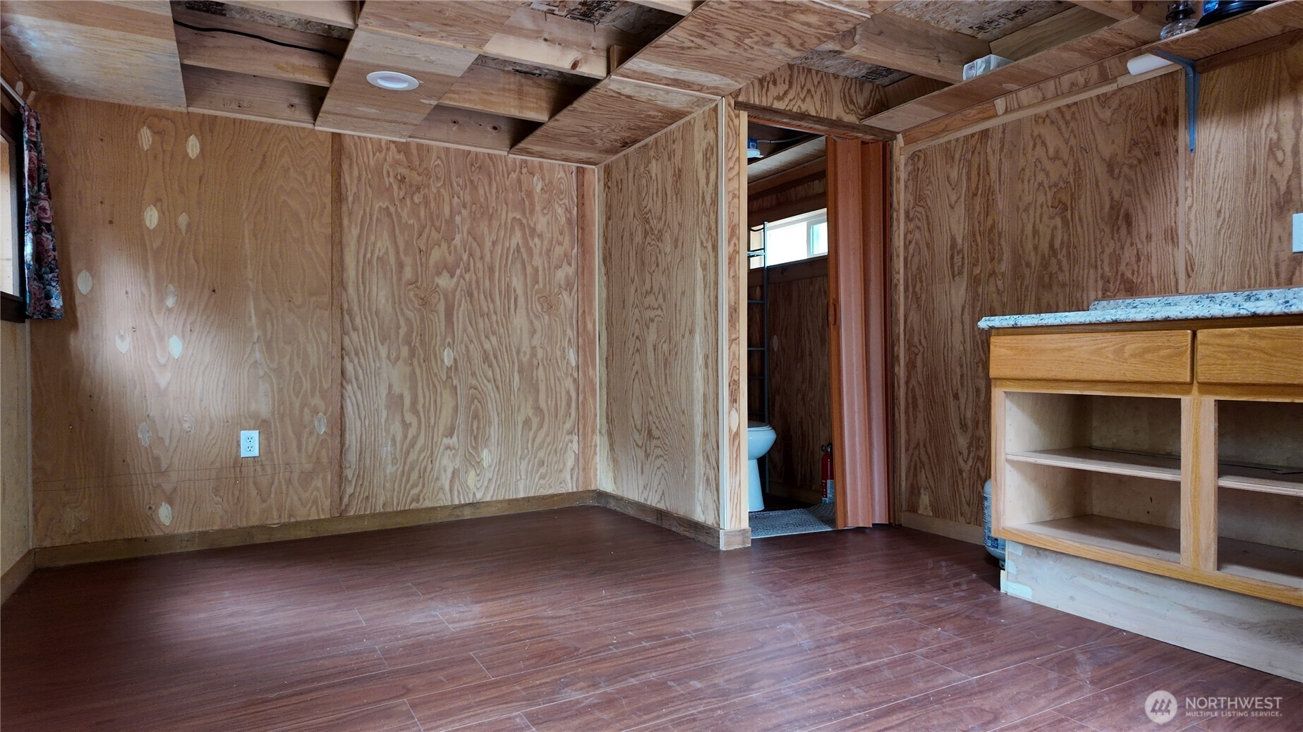 0 Cascade River Road, Unit D1203 Marblemount, WA 98267 - Photo 14 of 32 a view of an empty room with wooden floor and closet