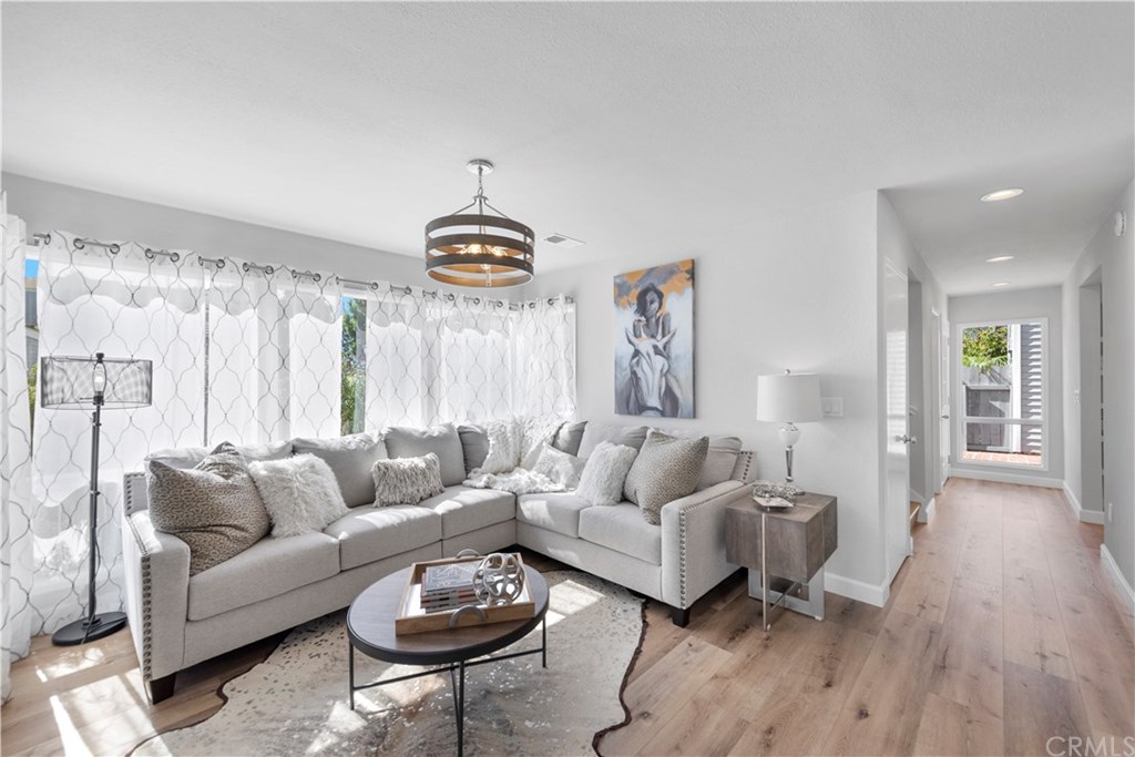24592 Harbor View Drive, Unit A Dana Point, CA 92629 - Photo 7 of 32 The main living area gets an abundance of natural light from the bay window, front window and sliding glass door.