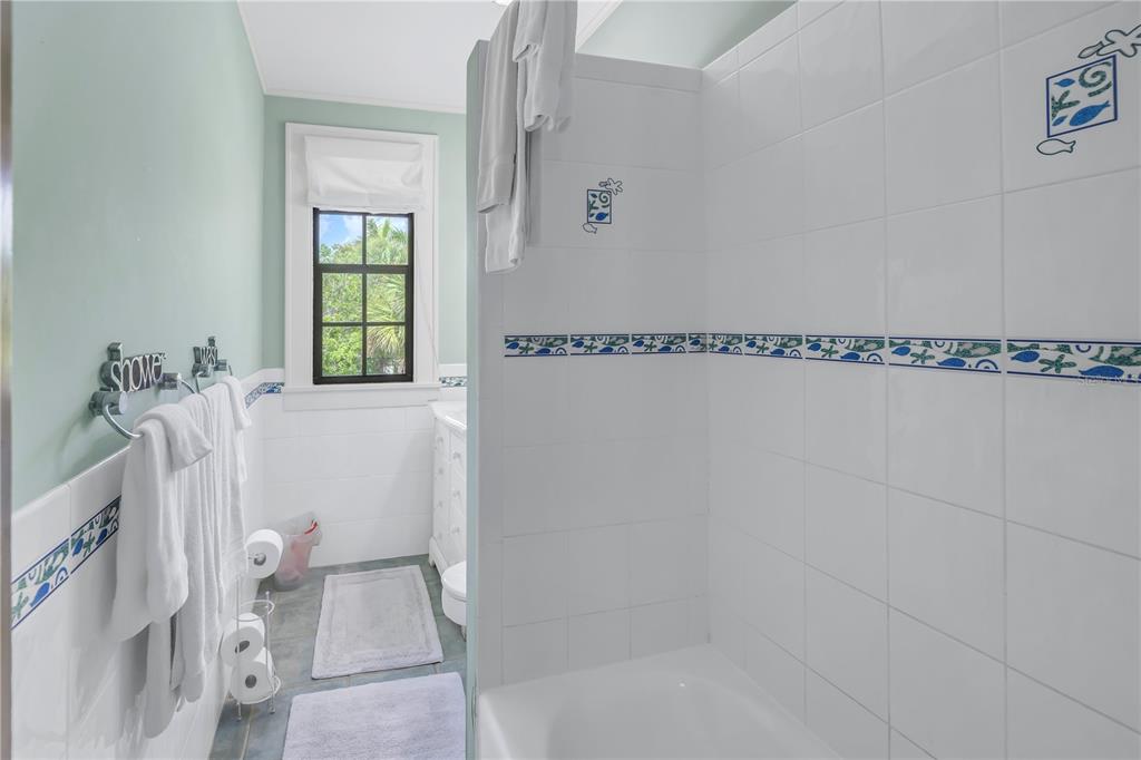 516 Gulf Boulevard Indian Rocks Beach, FL 33785 - Photo 46 of 97 a bathroom with a shower