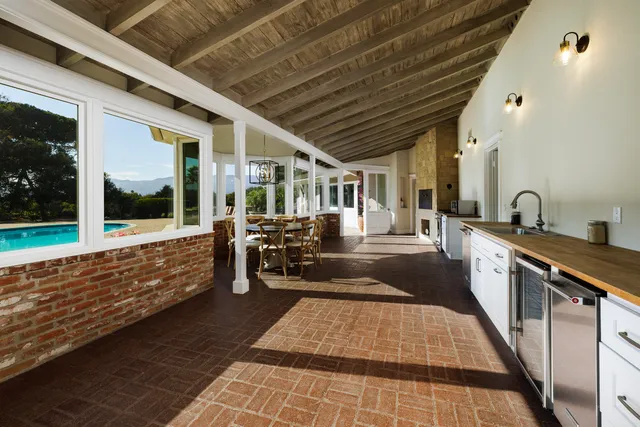 a lobby with furniture and window