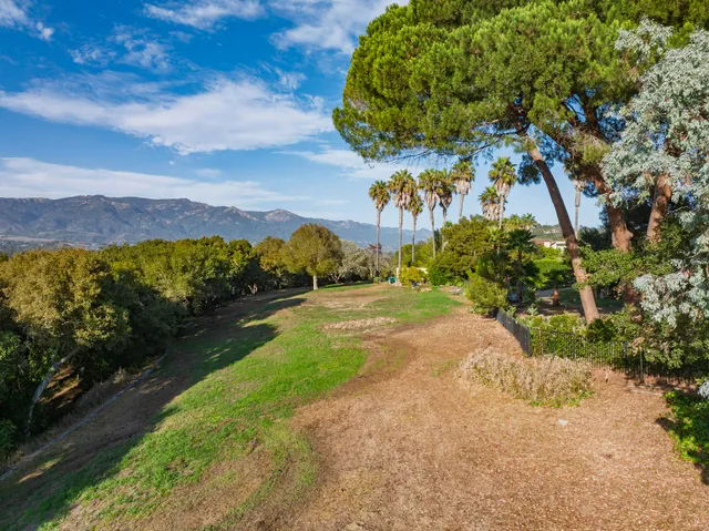 a view of a city street from a building