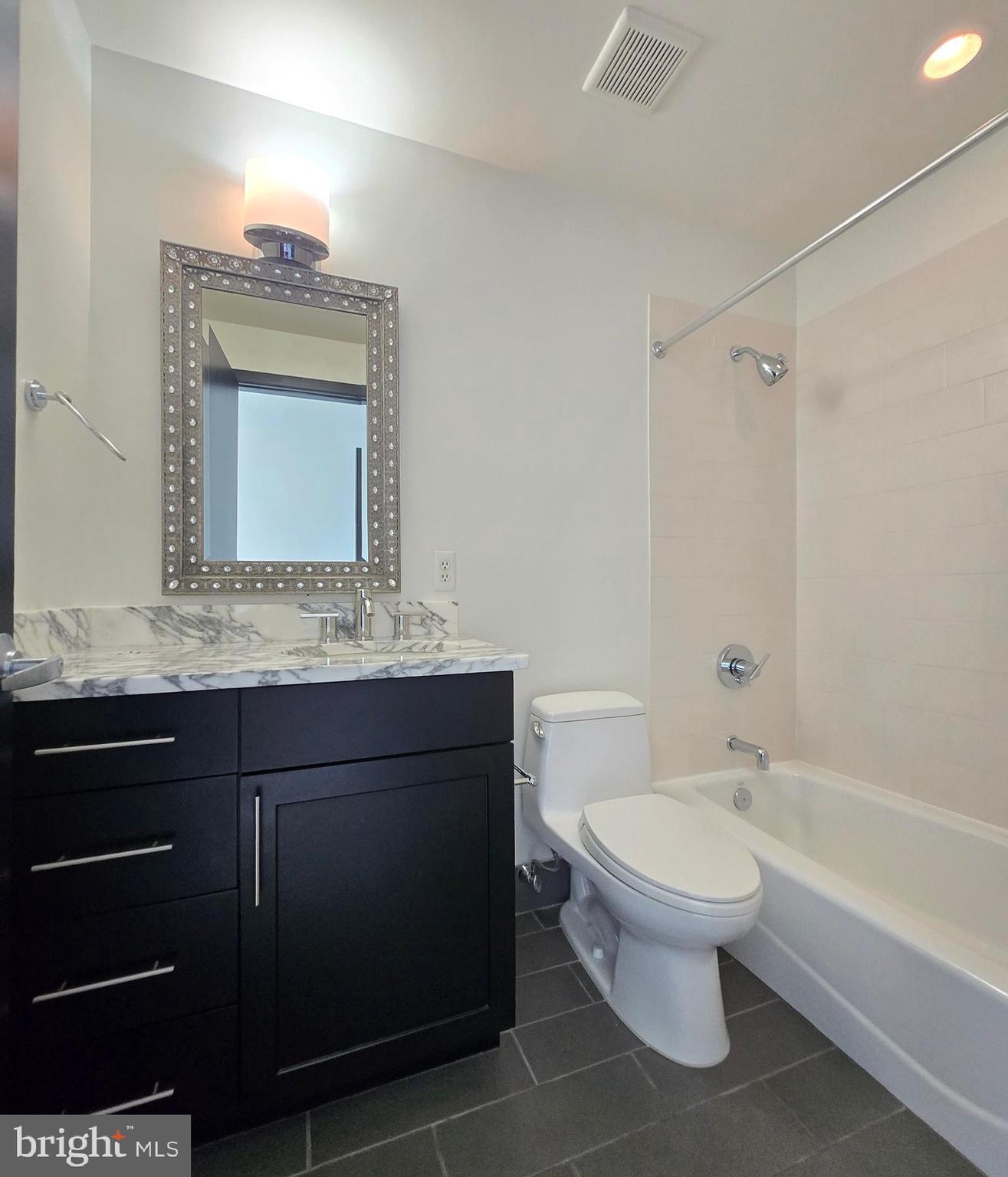 1200 Steuart Street, Unit 1913 Baltimore, MD 21230 - Photo 31 of 57 Contemporary full guest bath.