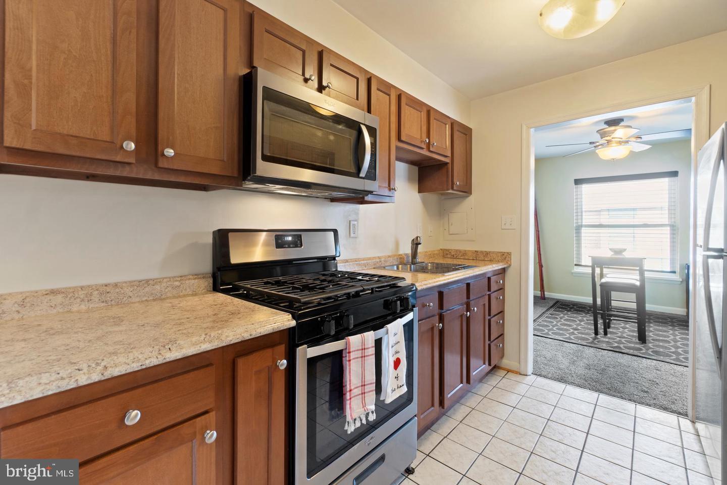 3807 St Barnabas Road, Unit 203 Suitland, MD 20746 - Photo 2 of 20 Charming kitchen with modern finishes.