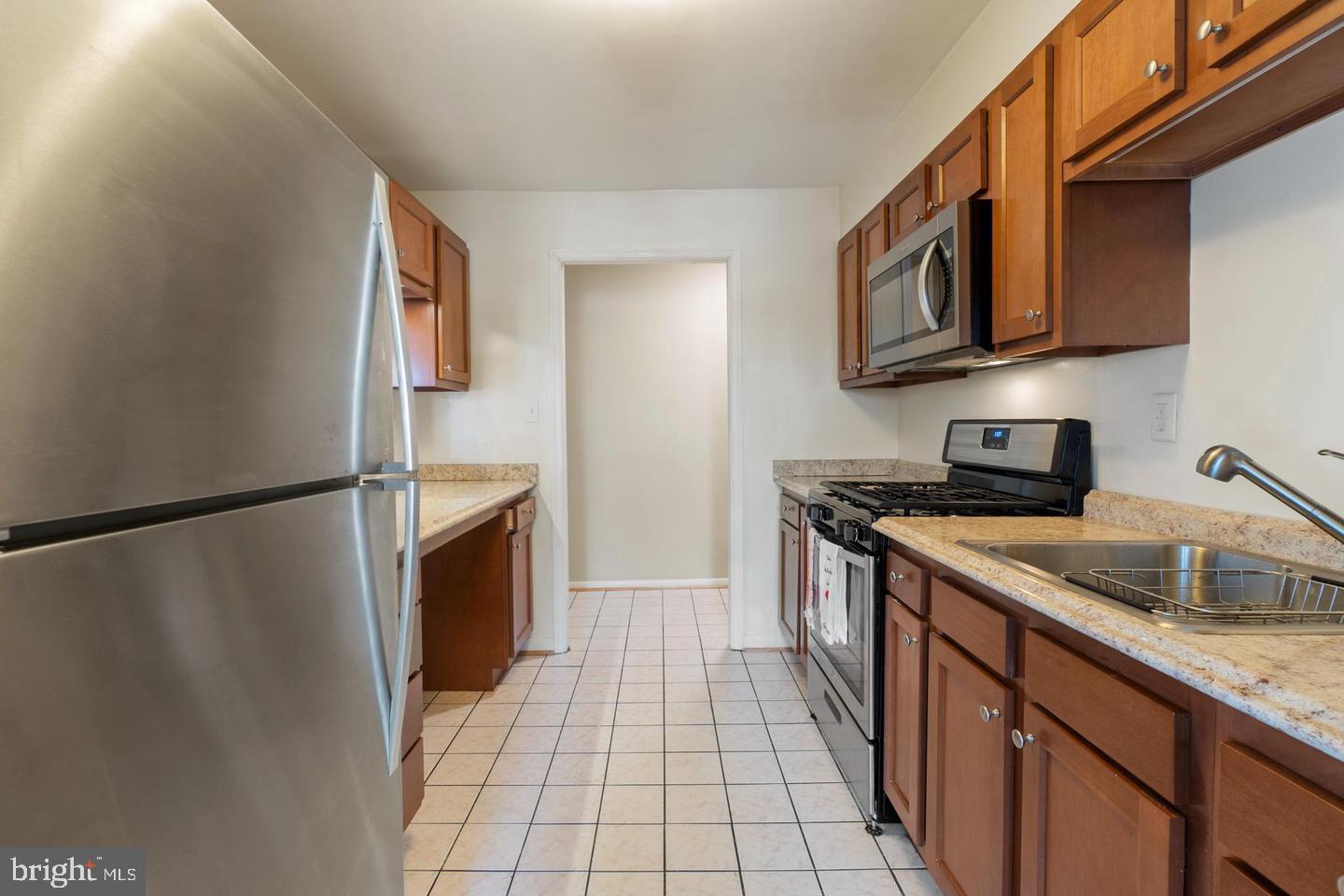 3807 St Barnabas Road, Unit 203 Suitland, MD 20746 - Photo 4 of 20 Modern kitchen with sleek finishes.