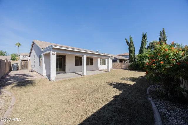 a house with trees in front of it