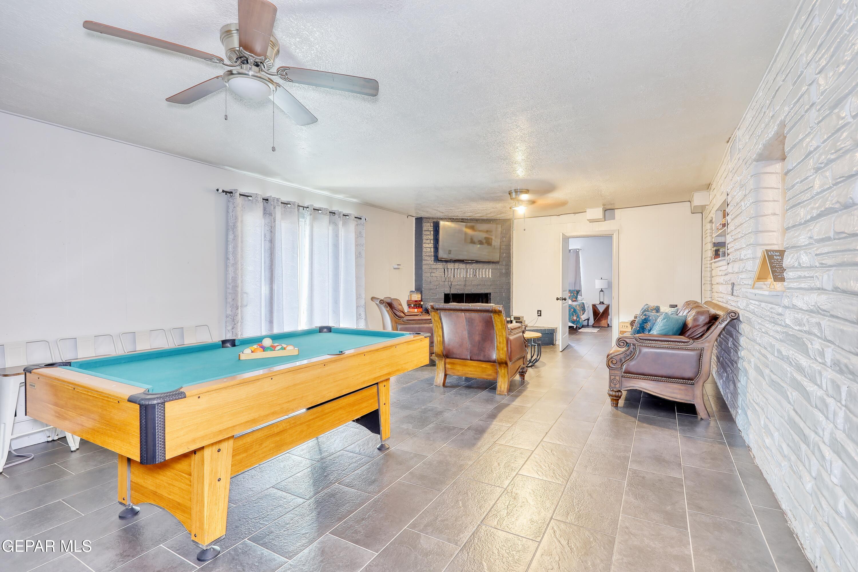 5912 Delta Drive El Paso, TX 79905 - Photo 11 of 37 a living room with furniture and pool table