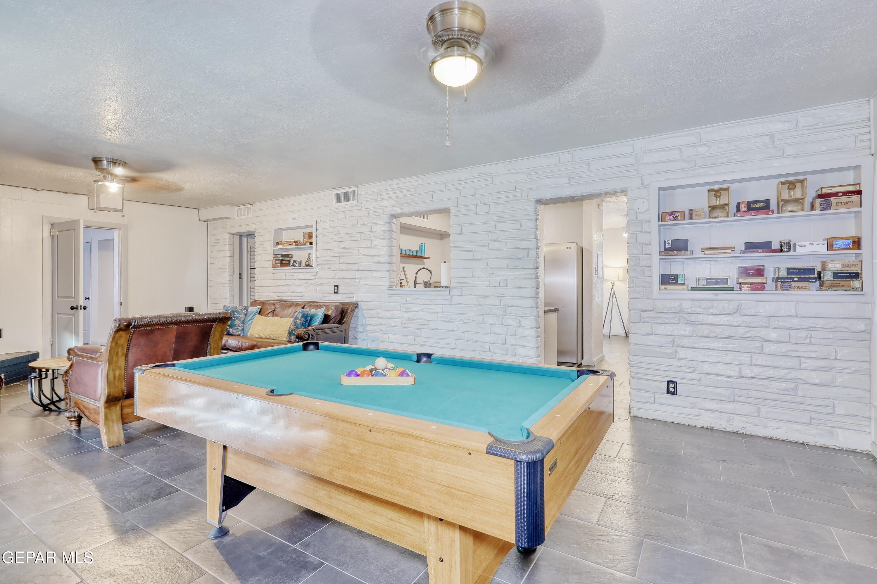5912 Delta Drive El Paso, TX 79905 - Photo 12 of 37 a room with pool table and windows