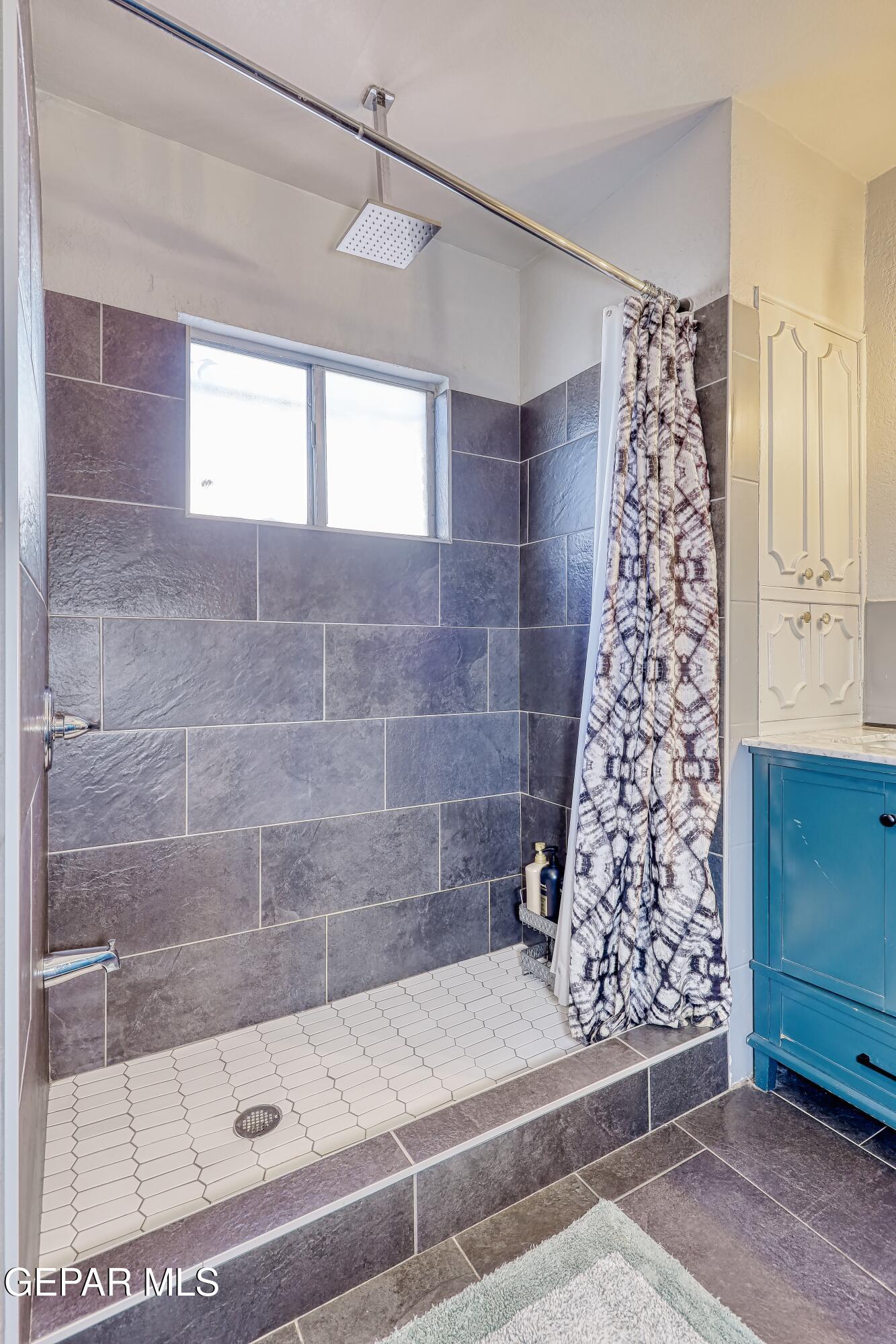 5912 Delta Drive El Paso, TX 79905 - Photo 24 of 37 a bathroom with a bathtub and shower