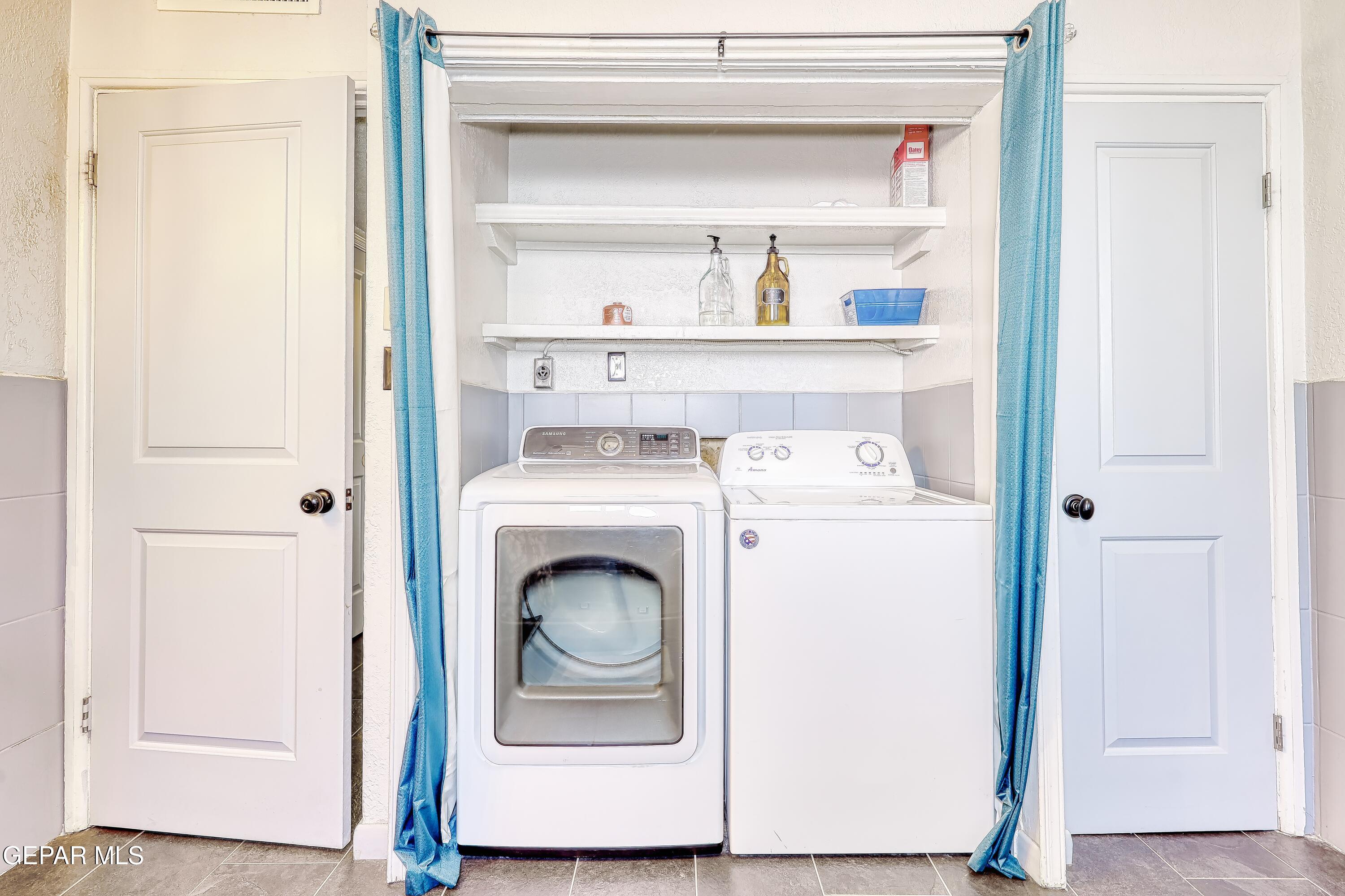 5912 Delta Drive El Paso, TX 79905 - Photo 27 of 37 a utility room with dryer and washer