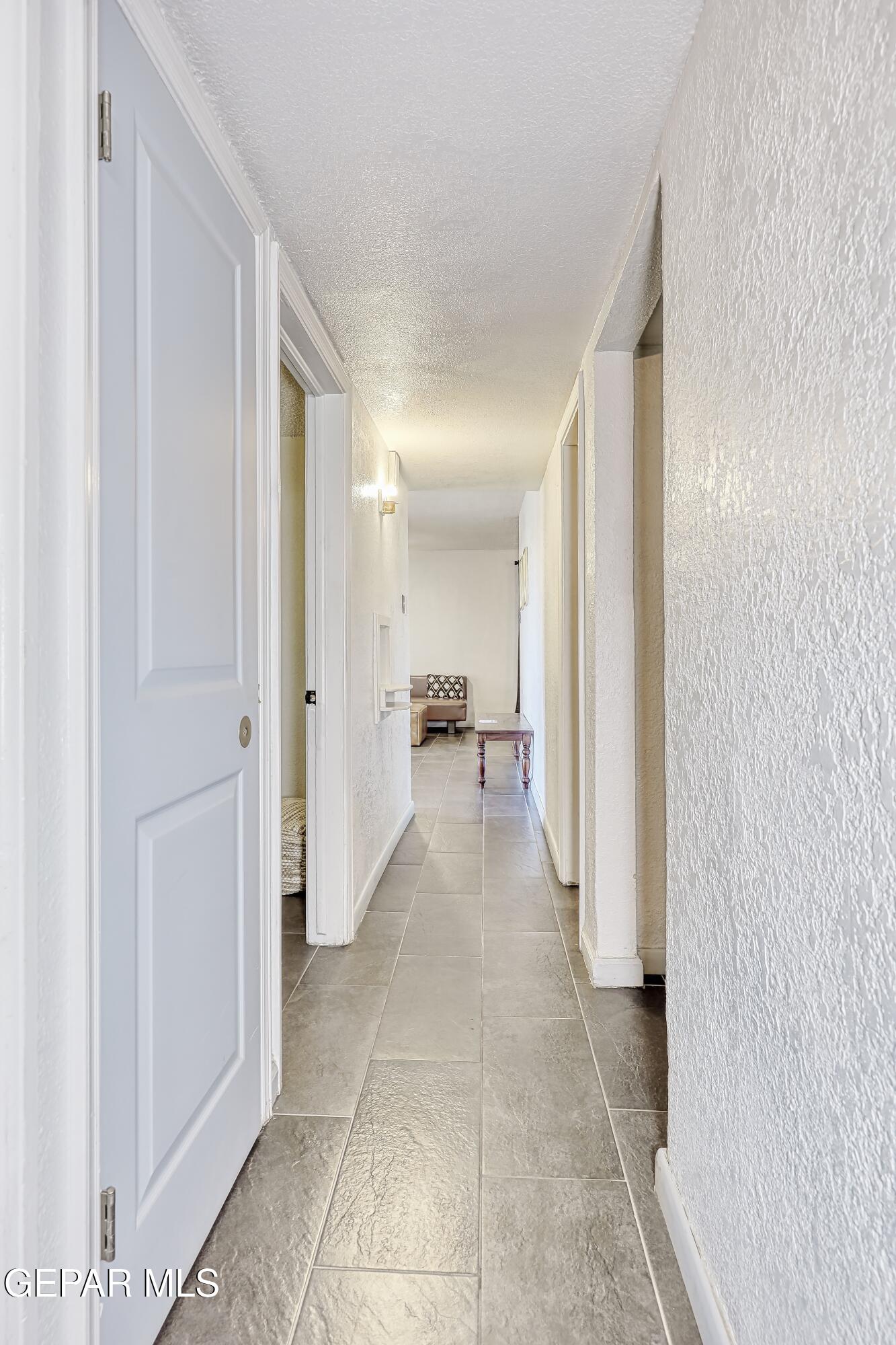 5912 Delta Drive El Paso, TX 79905 - Photo 30 of 37 a view of a hallway with a furniture