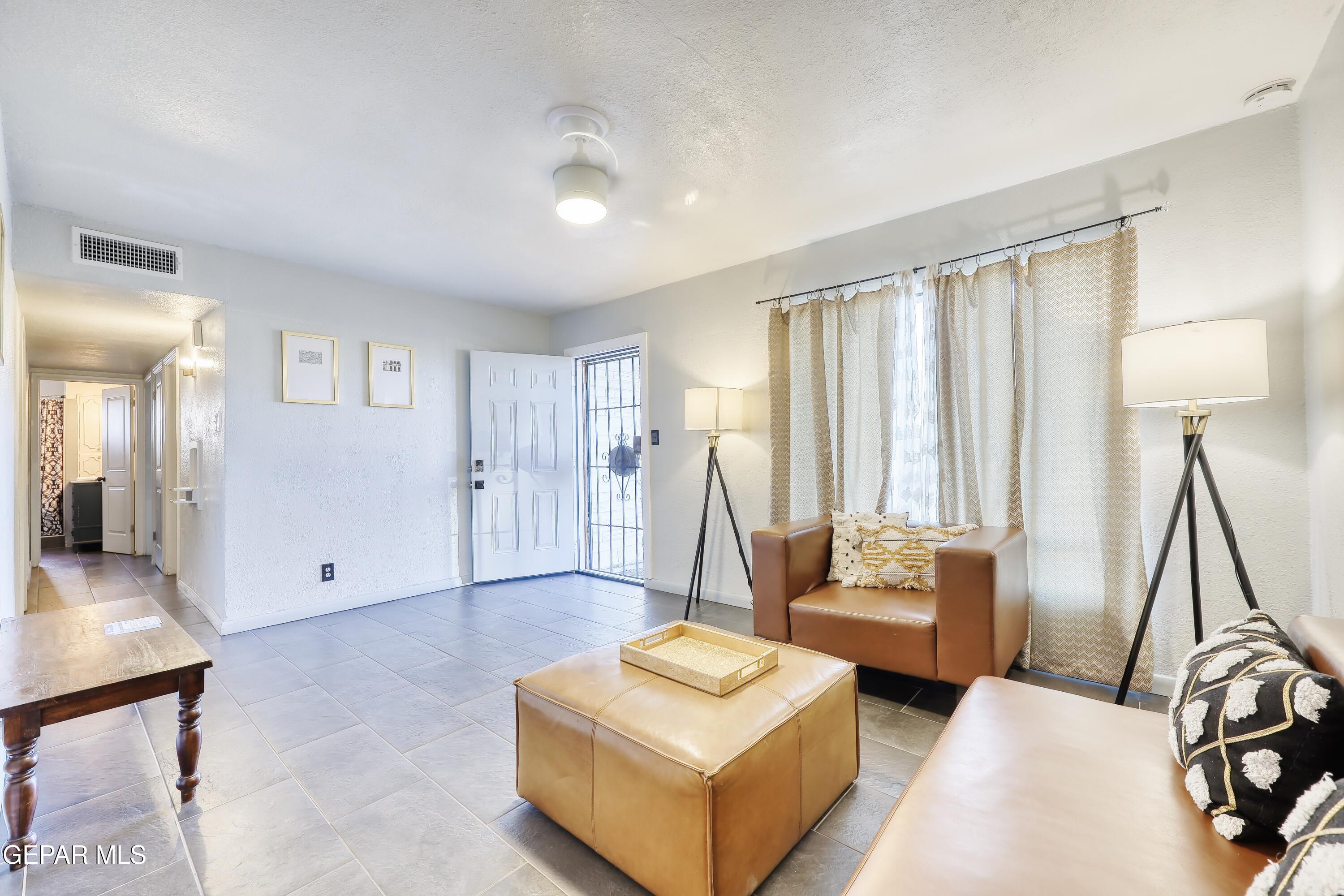 5912 Delta Drive El Paso, TX 79905 - Photo 3 of 37 a living room with furniture and a large window