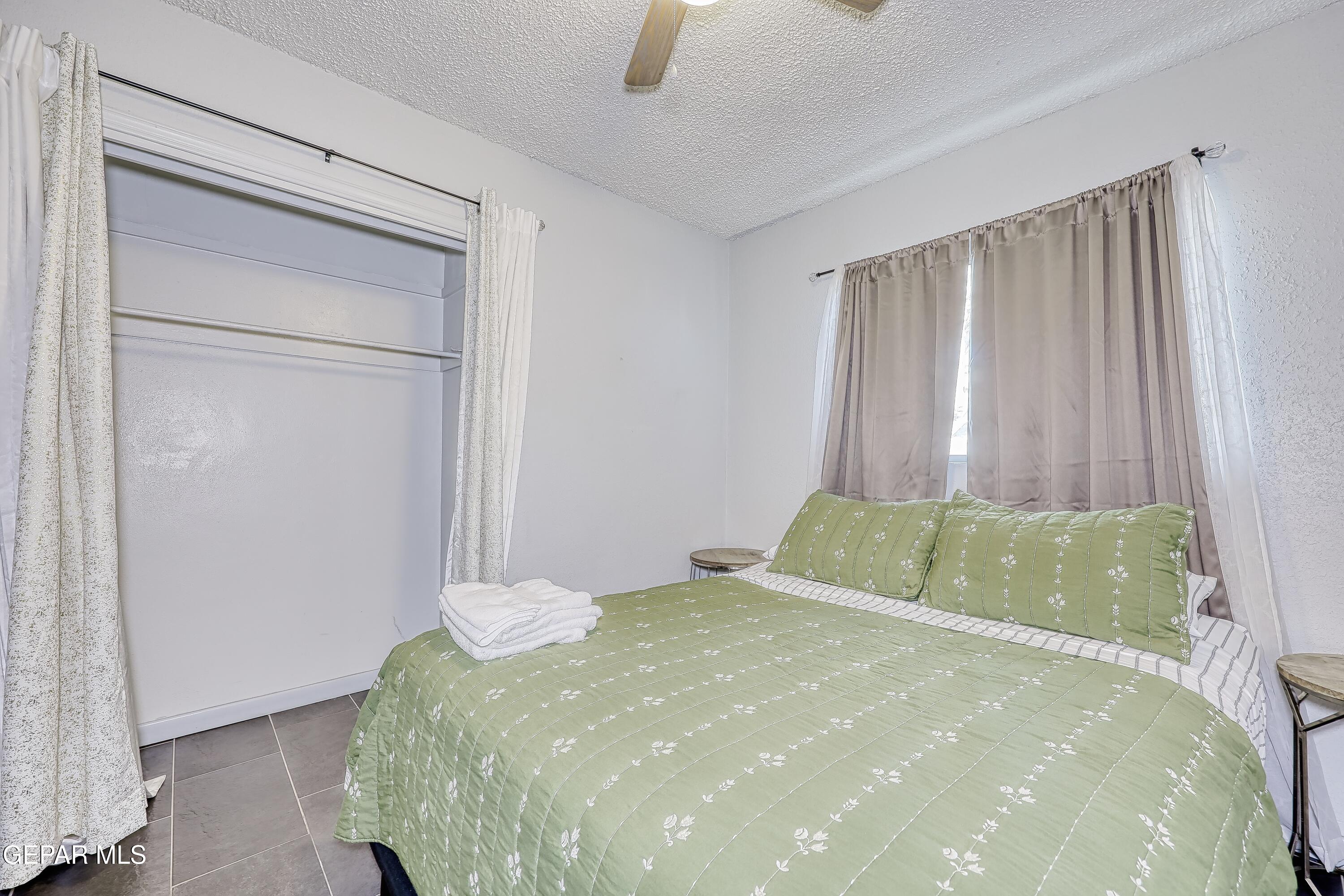 5912 Delta Drive El Paso, TX 79905 - Photo 32 of 37 a large bed sitting in a room