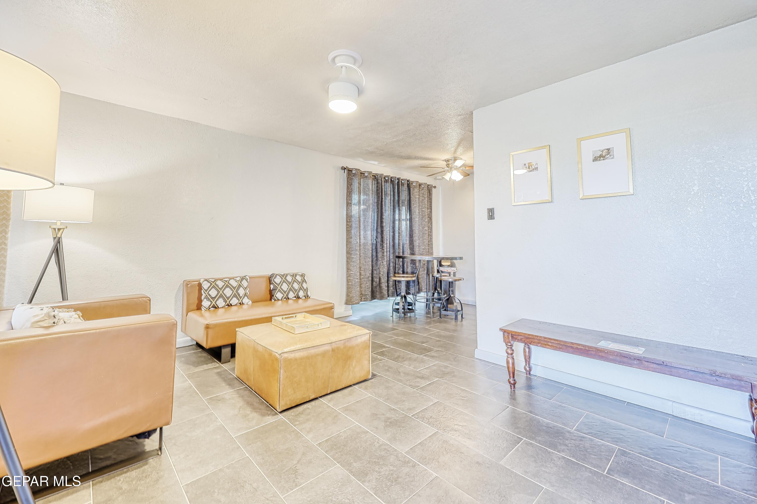 5912 Delta Drive El Paso, TX 79905 - Photo 4 of 37 a living room with furniture and a table