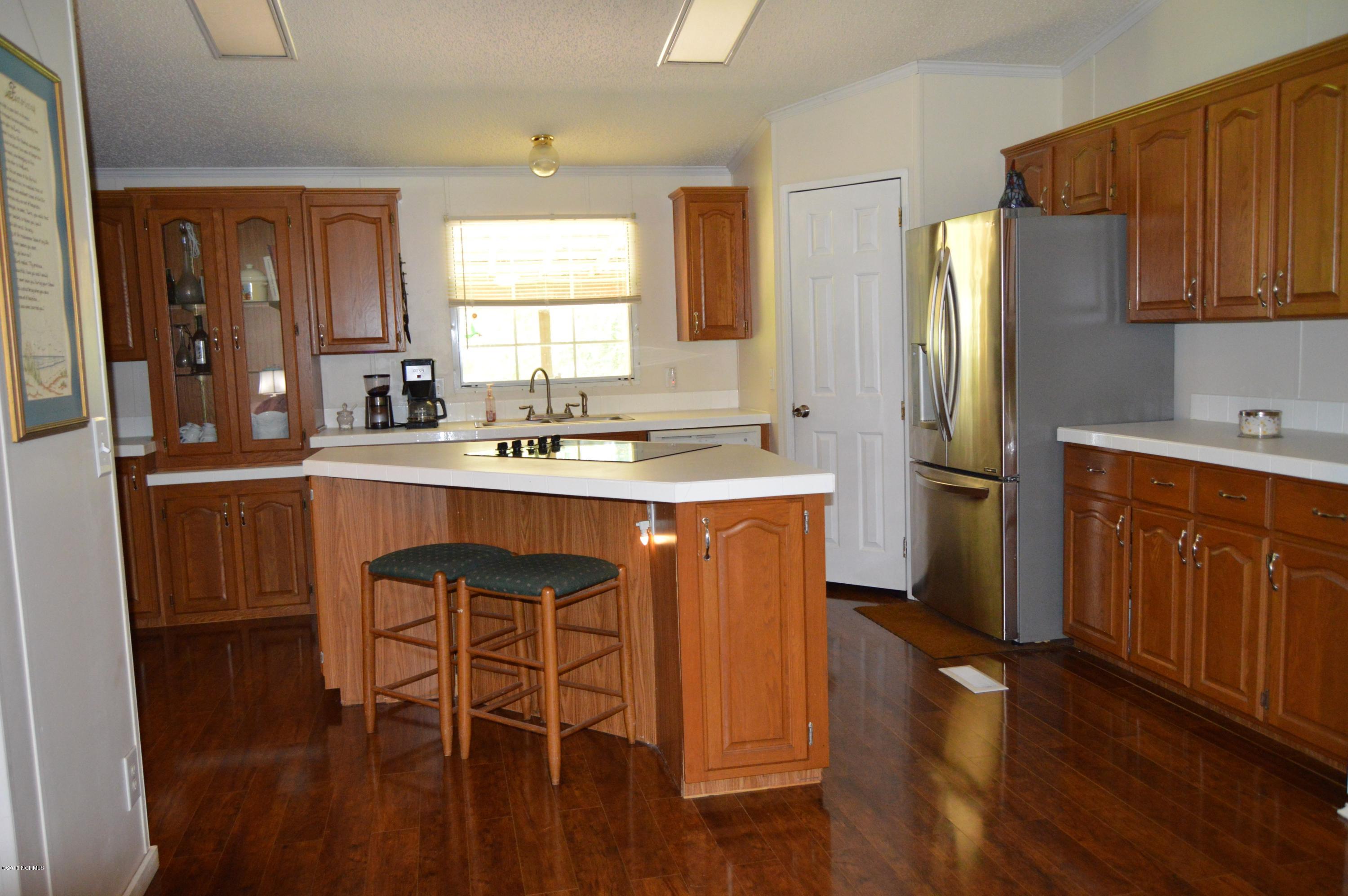 8804 Highsmith Road Rocky Point, NC 28457 - Photo 8 of 38 kitchen 1