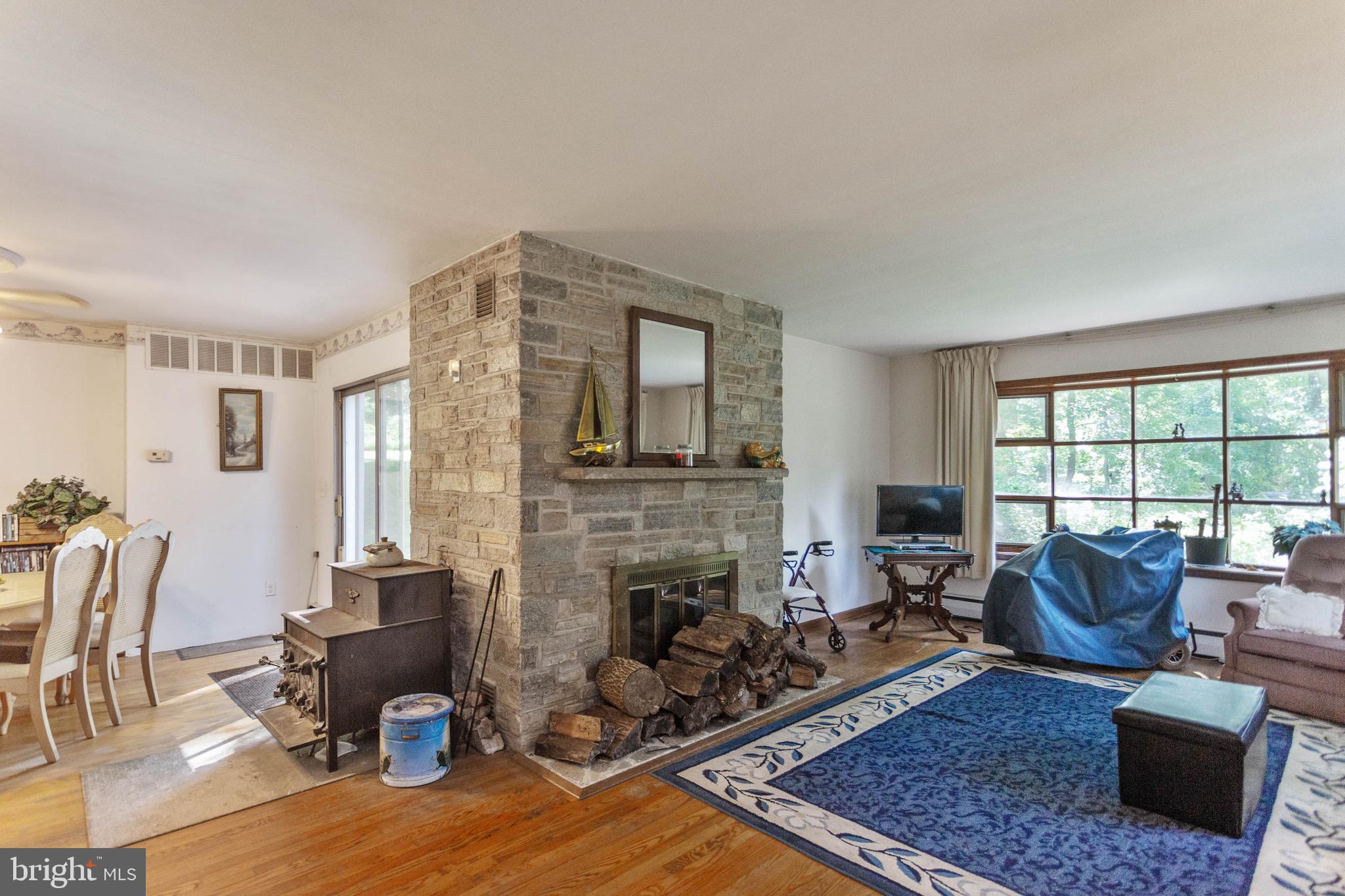 7010 Lancaster Road Pikesville, MD 21207 - Photo 3 of 23 Wood Burning Stove & Fireplace in Bright LR