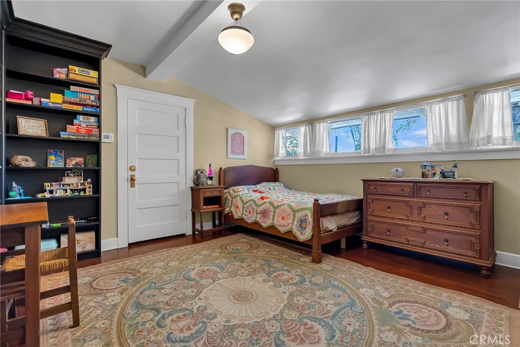 4450 4th Street Riverside, CA 92501 - Photo 30 of 43 a bedroom with a bed and a window