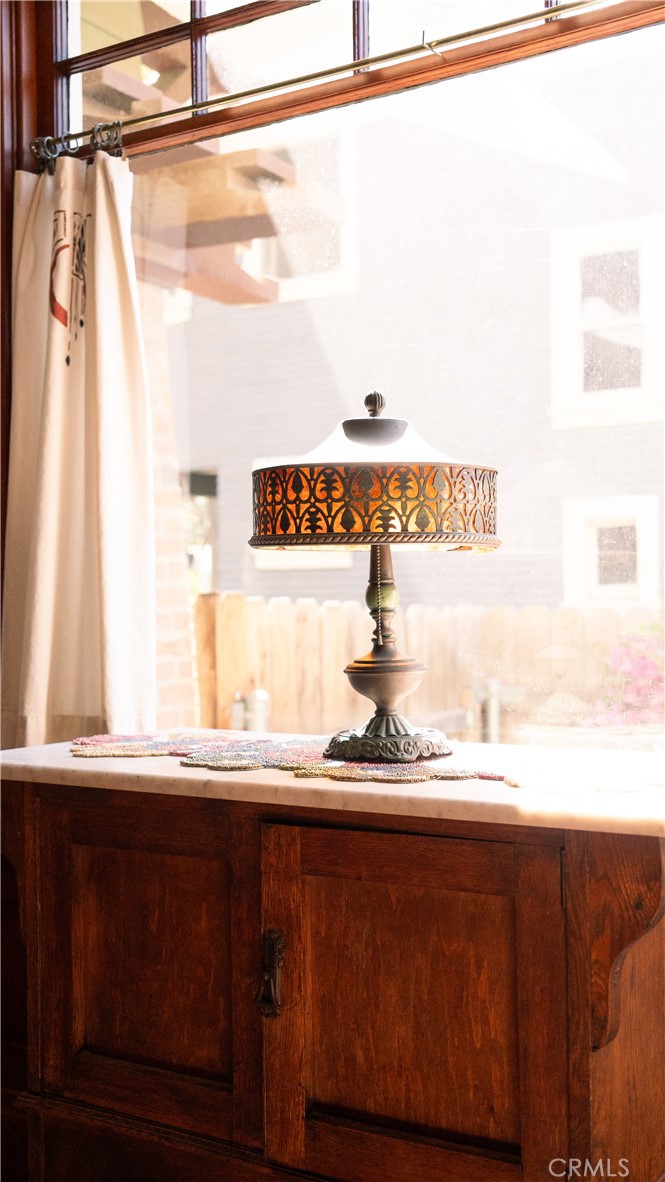 4450 4th Street Riverside, CA 92501 - Photo 41 of 43 a close up of a sink and a mirror
