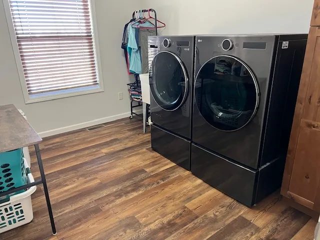 a utility room with dryer and washer
