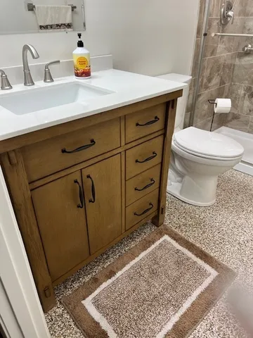 a bathroom with a sink and a toilet
