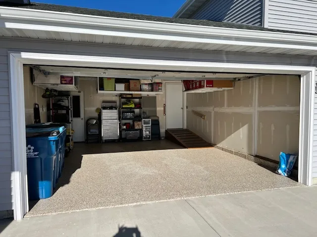 a bedroom with a large bed and a large dresser