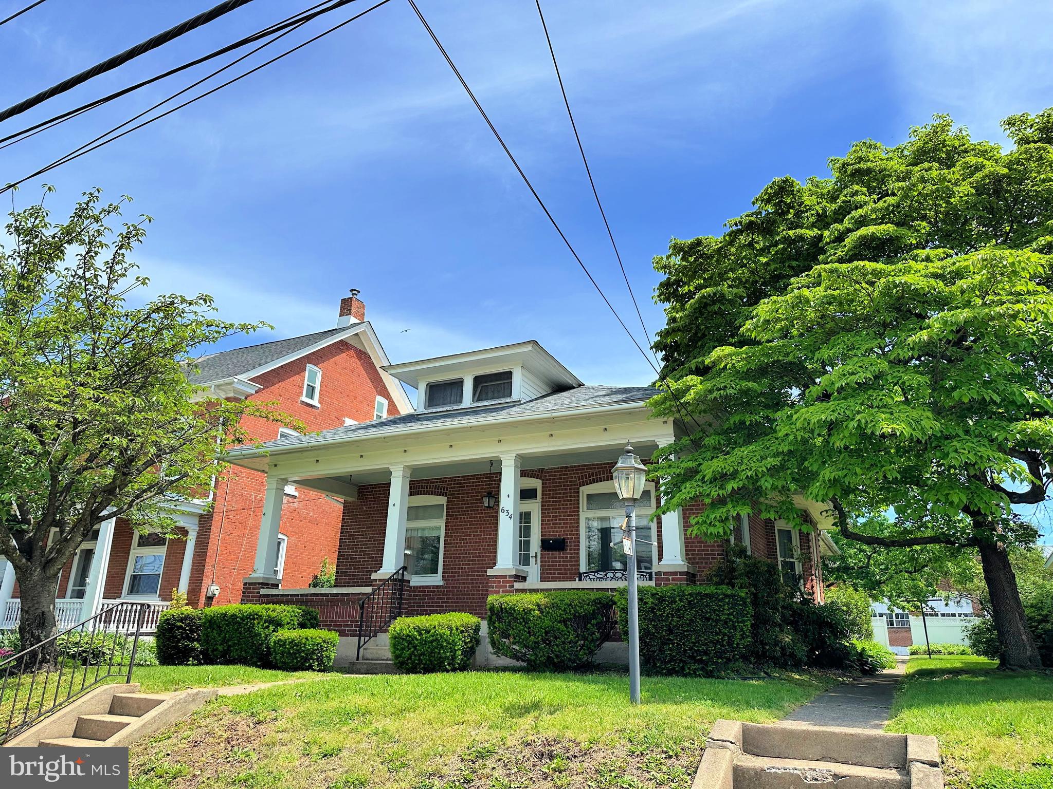 634 Main Street Red Hill, PA 18076 - Photo 2 of 34 a front view of a house with garden