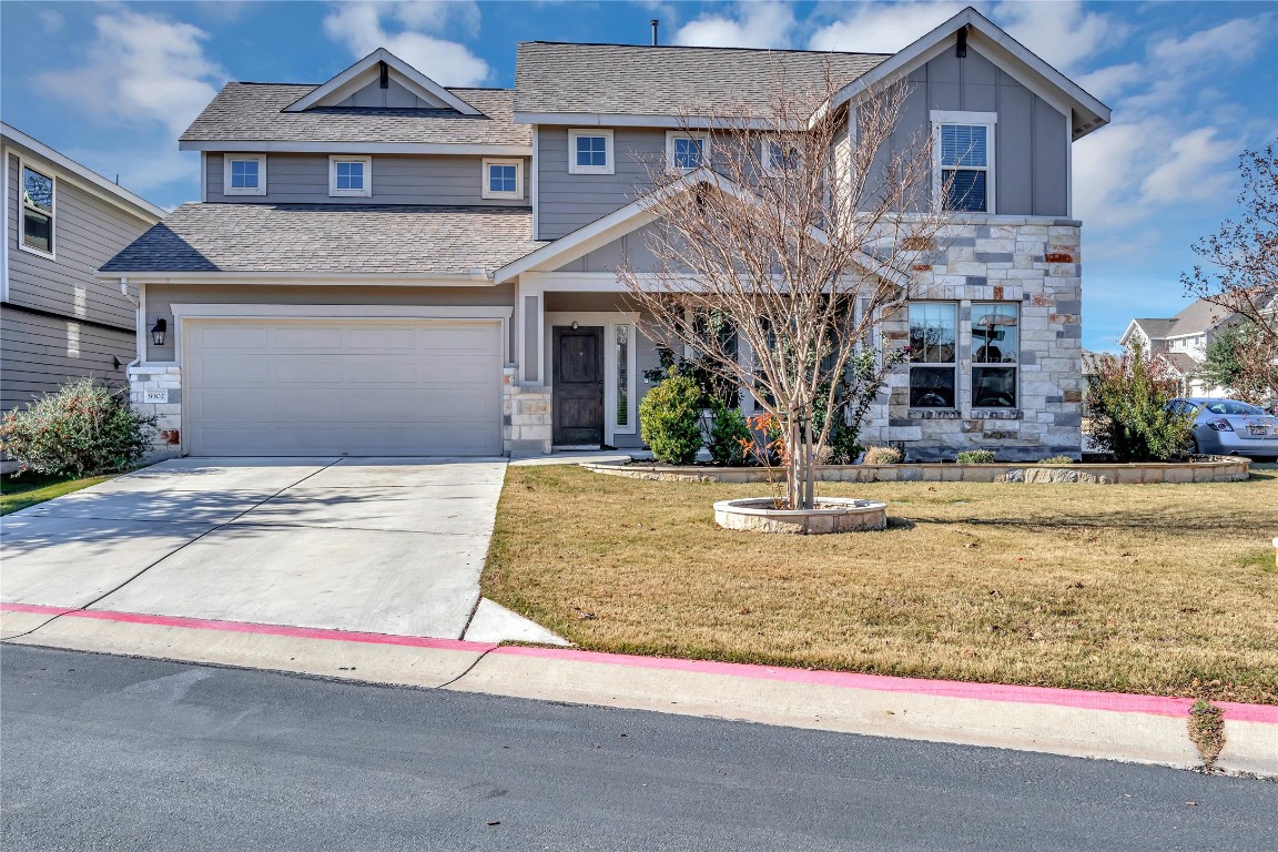 9302 McKnight Loop, Unit 43 Austin, TX 78717 - Photo 1 of 24 a front view of a house with garden