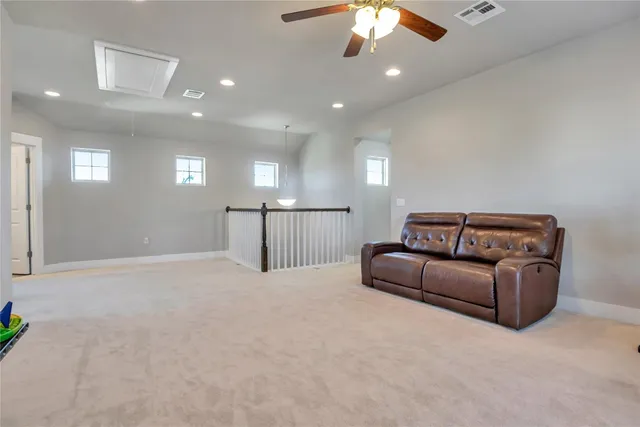 a view of a livingroom with furniture