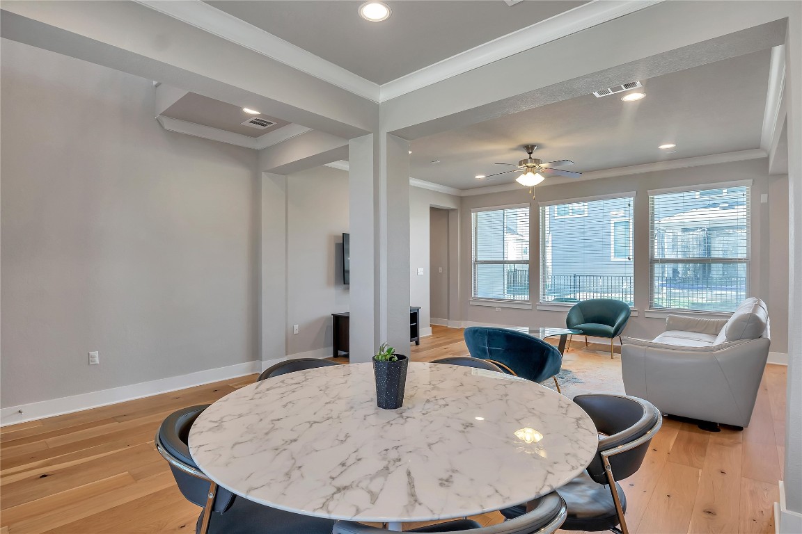9302 McKnight Loop, Unit 43 Austin, TX 78717 - Photo 10 of 24 a living room with furniture and a wooden floor