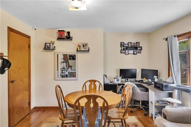 a view of a workspace with furniture