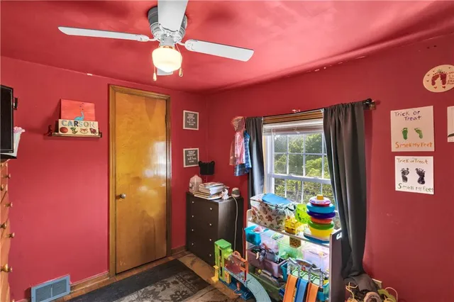 a very nice looking room with a dining table and a chandelier