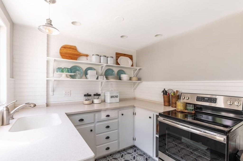 2 Ross Road Topsfield, MA 01983 - Photo 15 of 36 a kitchen with cabinets and appliances