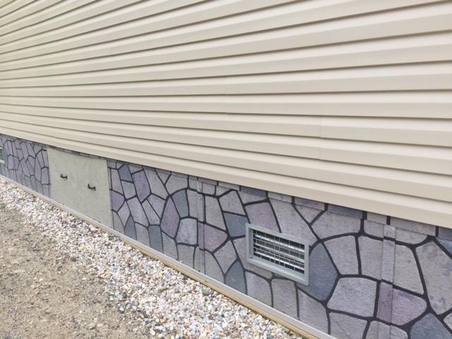 544 Walker Road Lyman, ME 04002 - Photo 12 of 20 Stone veneer and vents