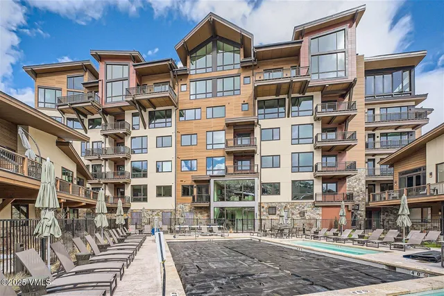 a front view of a building with a street