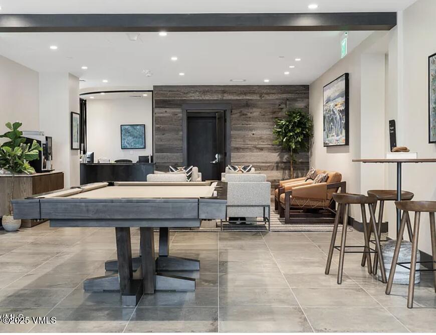 42 Riverfront Lane, Unit 205 Avon, CO 81620 - Photo 14 of 20 a living room with furniture and a potted plant
