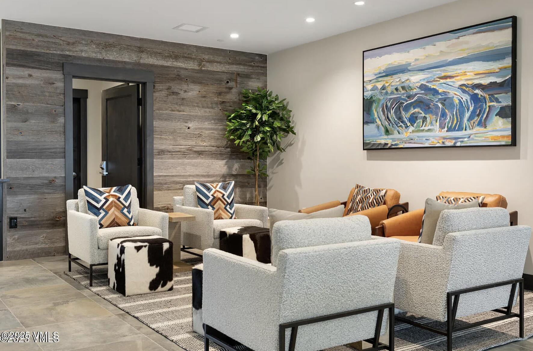 42 Riverfront Lane, Unit 205 Avon, CO 81620 - Photo 15 of 20 a living room with furniture and a potted plant