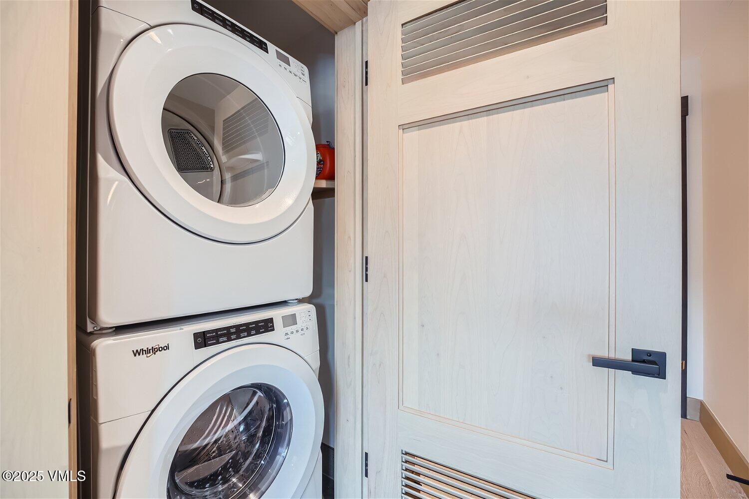42 Riverfront Lane, Unit 205 Avon, CO 81620 - Photo 8 of 20 a utility room with dryer and washer