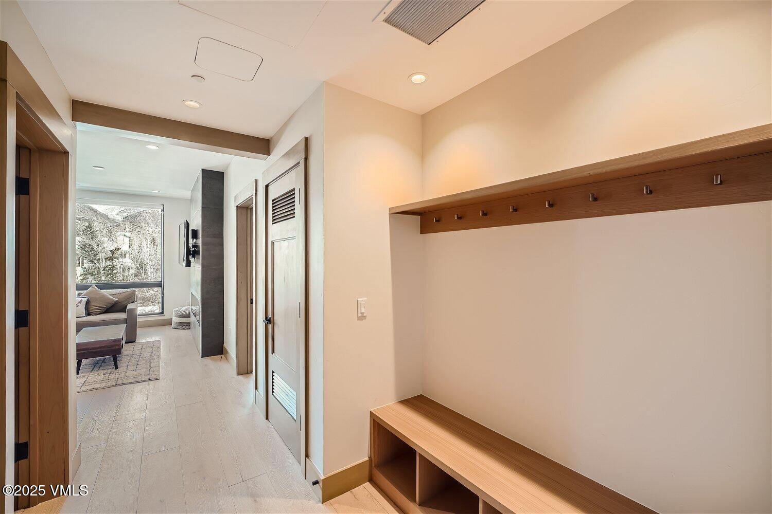 42 Riverfront Lane, Unit 205 Avon, CO 81620 - Photo 9 of 20 a view of a hallway with bathroom and a hallway