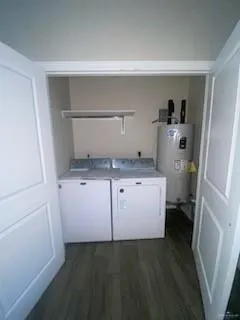 a room with a cabinets and utility room
