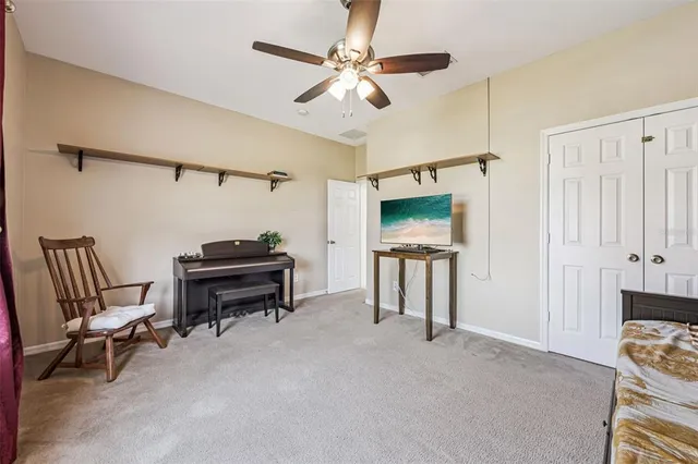 a bathroom with a double vanity sink mirror and toilet