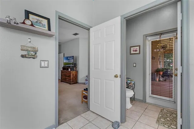 a view of a livingroom with furniture and windows
