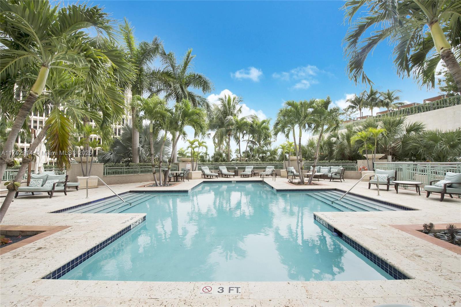 3400 Southwest 27th Avenue, Unit 1003 Coconut Grove, FL 33133 - Photo 11 of 18 a view of swimming pool with outdoor seating