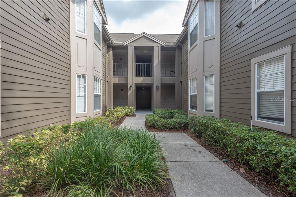417 Summit Ridge Place, Unit 111 Longwood, FL 32779 - Photo 1 of 1 Entrance way to home. Condo is unit on the right.