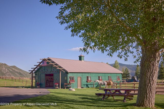 a view of a lake with a big yard
