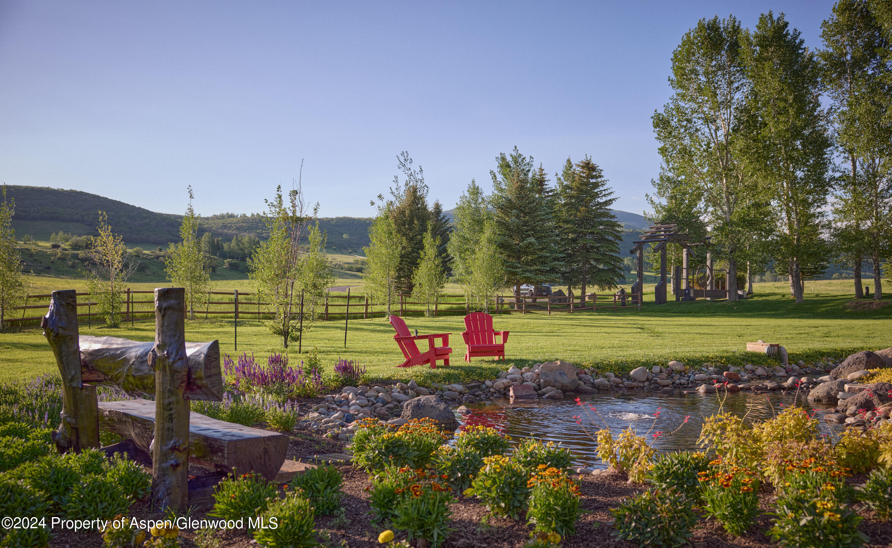 910 White Star Drive Aspen, CO 81612 - Photo 59 of 66 a view of a water fountain and an outdoor seating