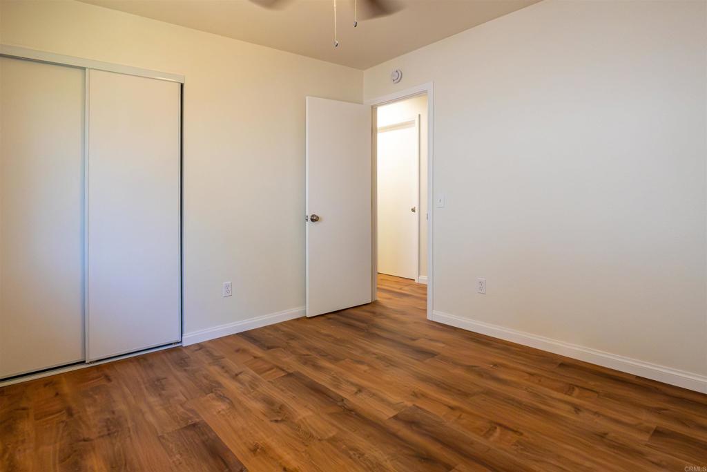 2319 Ridgeway Drive National City, CA 91950 - Photo 15 of 26 a view of an empty room with wooden floor